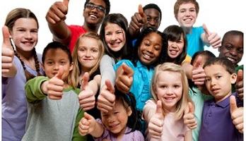 Group of young people from different backgrounds smiling with their thumbs raised